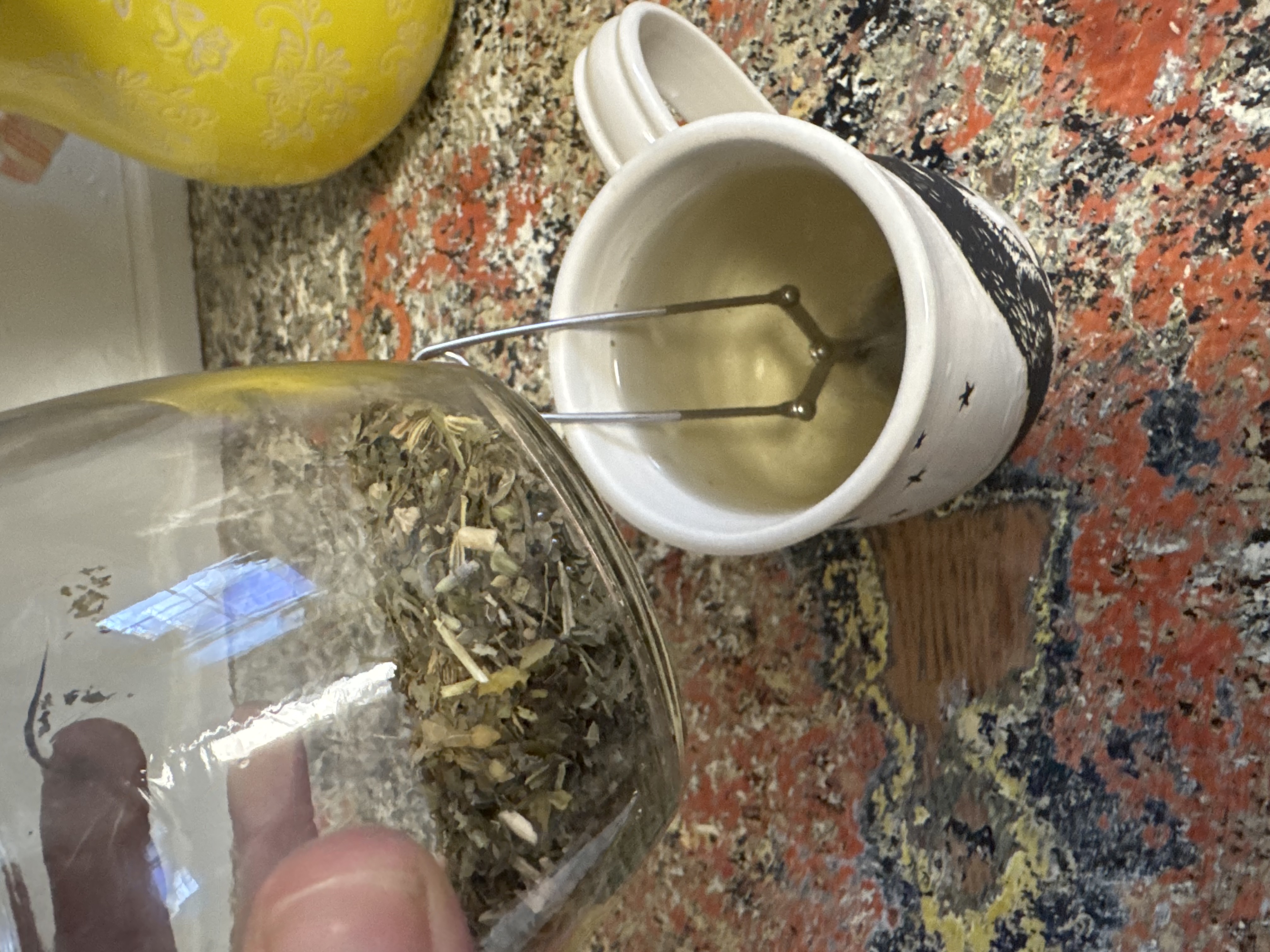 Tea being prepared with loose herbs